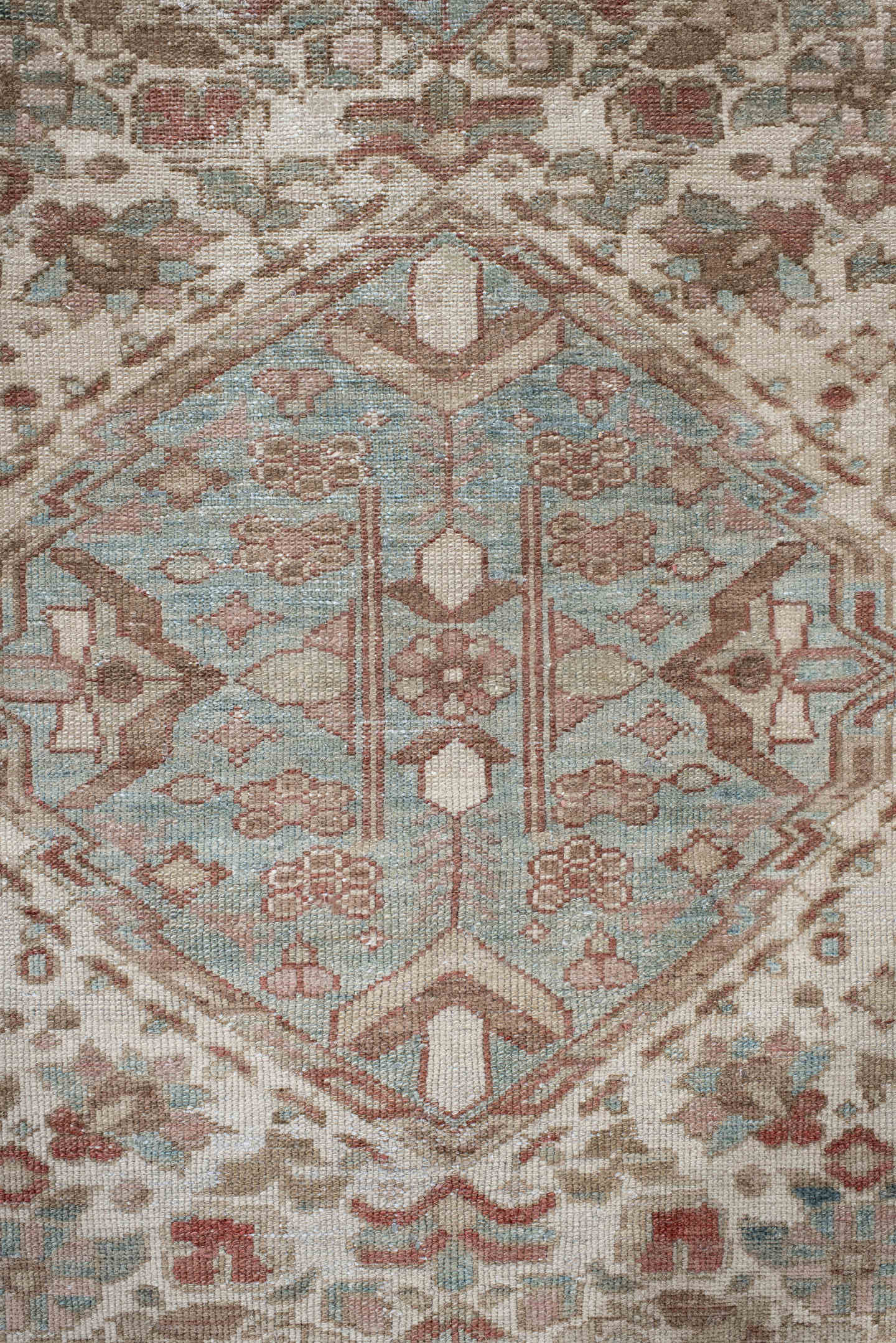 6' x 10' one-of-a-kind handmade antique Baktiary large size rug. Color palette: ivory, dusty blue, rose, taupe, terra cotta