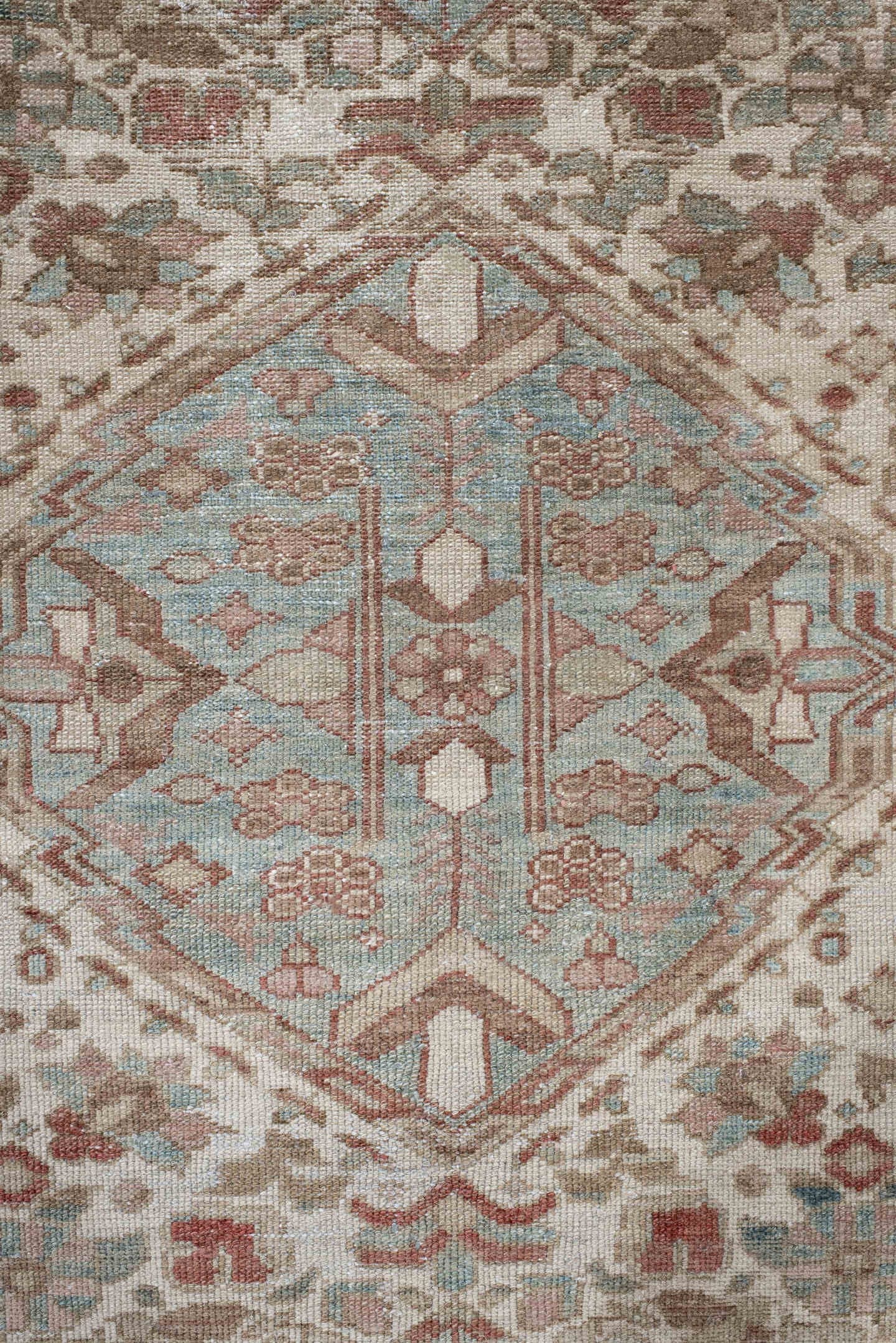 6' x 10' one-of-a-kind handmade antique Baktiary large size rug. Color palette: ivory, dusty blue, rose, taupe, terra cotta