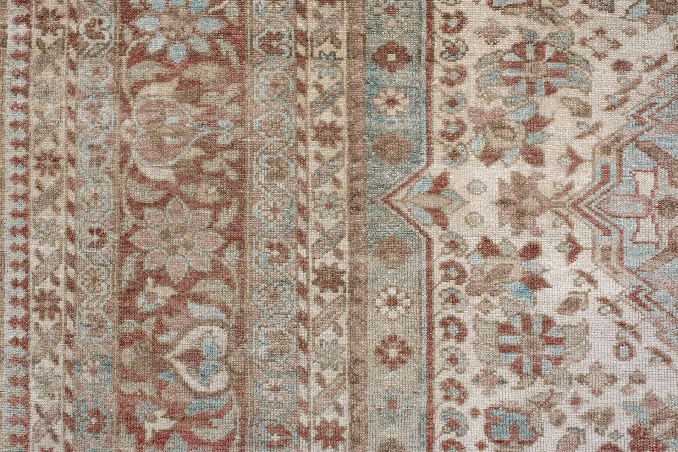 6' x 10' one-of-a-kind handmade antique Baktiary large size rug. Color palette: ivory, dusty blue, rose, taupe, terra cotta
