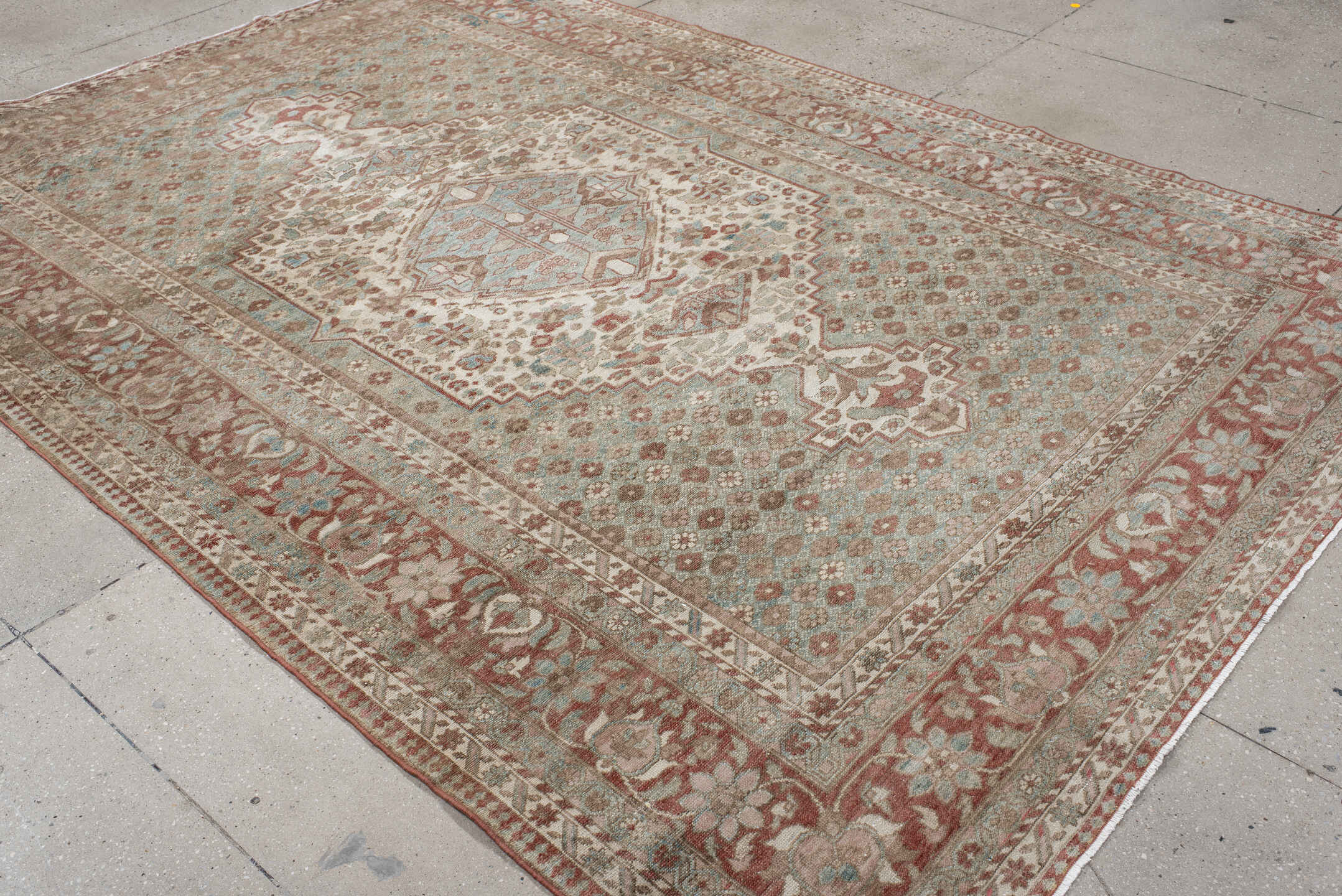 6' x 10' one-of-a-kind handmade antique Baktiary large size rug. Color palette: ivory, dusty blue, rose, taupe, terra cotta