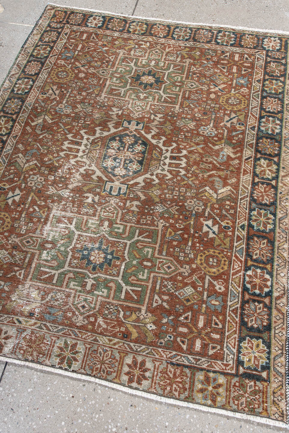 3' x 4' one-of-a-kind handmade antique Karaje small size rug. Color palette: rust, ivory, navy, sage, camel, gold