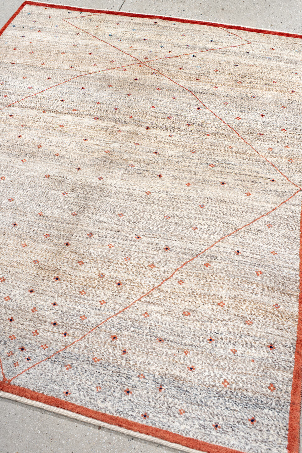 5' x 6' one-of-a-kind handmade vintage Gabbe rug. Color palette: ivory, rust, taupe, charcoal, navy, coral, terracotta