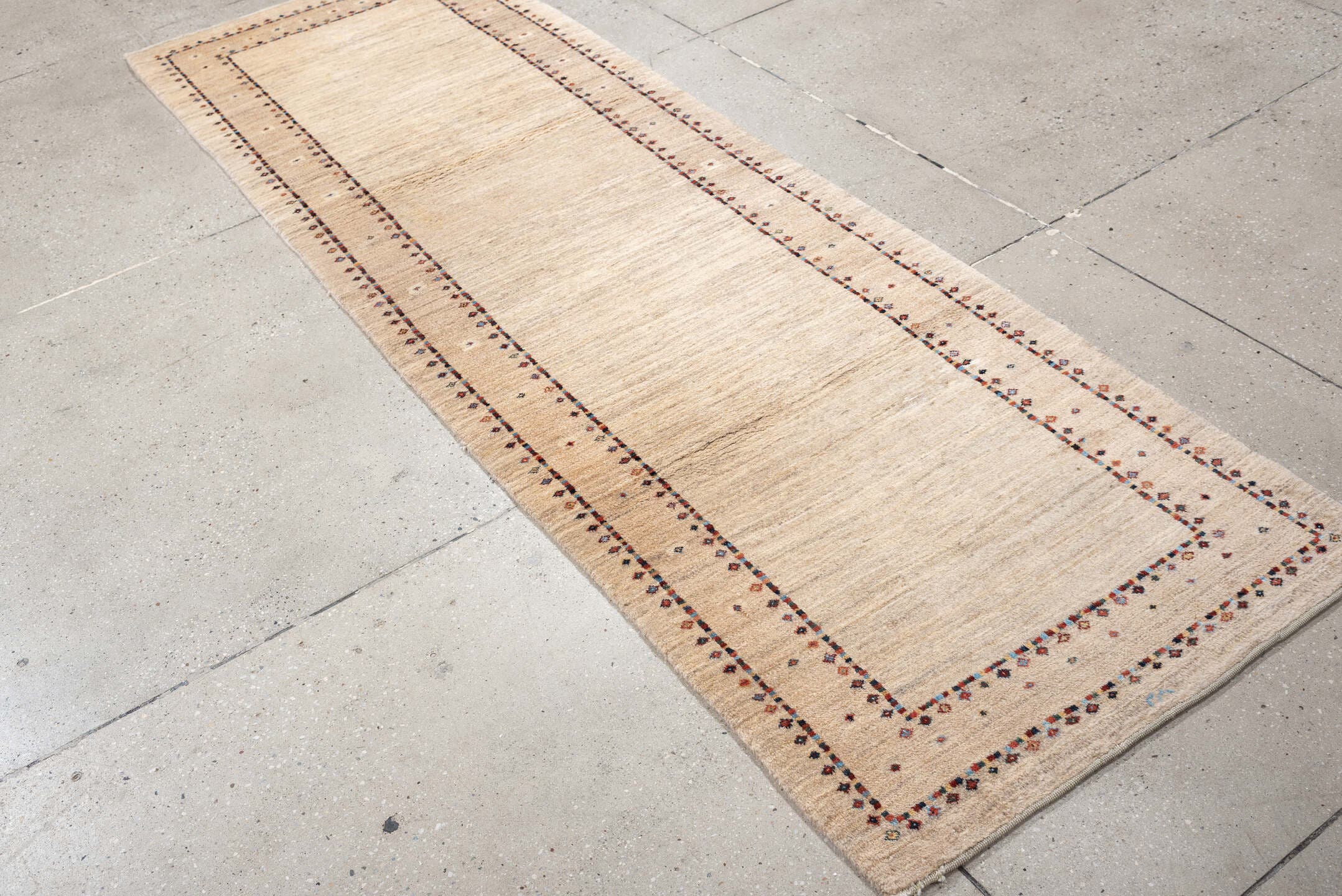 2' x 8' one-of-a-kind handmade vintage Gabbe runner rug. Color palette: ivory, cream, taupe, rust, navy, blue gray, beige