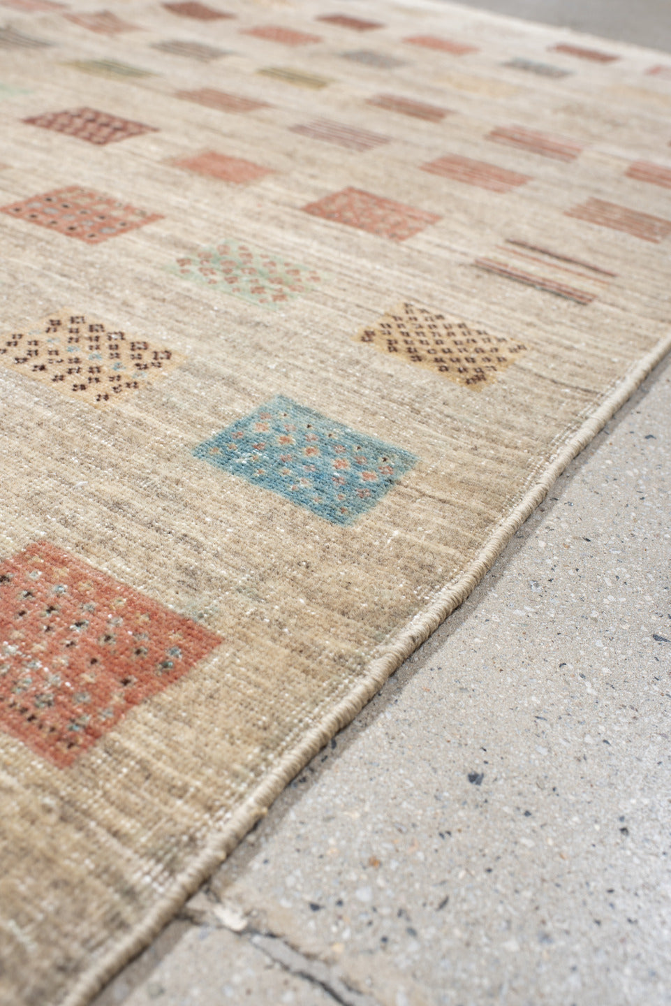 5' x 6' one-of-a-kind handmade vintage Gabbe rug. Color palette: antiquewhite, black, brown, gray, light gray, off-white