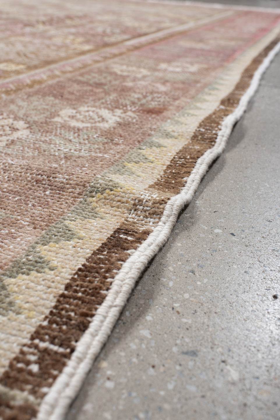 6' x 11' one-of-a-kind handmade vintage European large size rug. Color palette: brown, red, off-white, pink, gray, orange