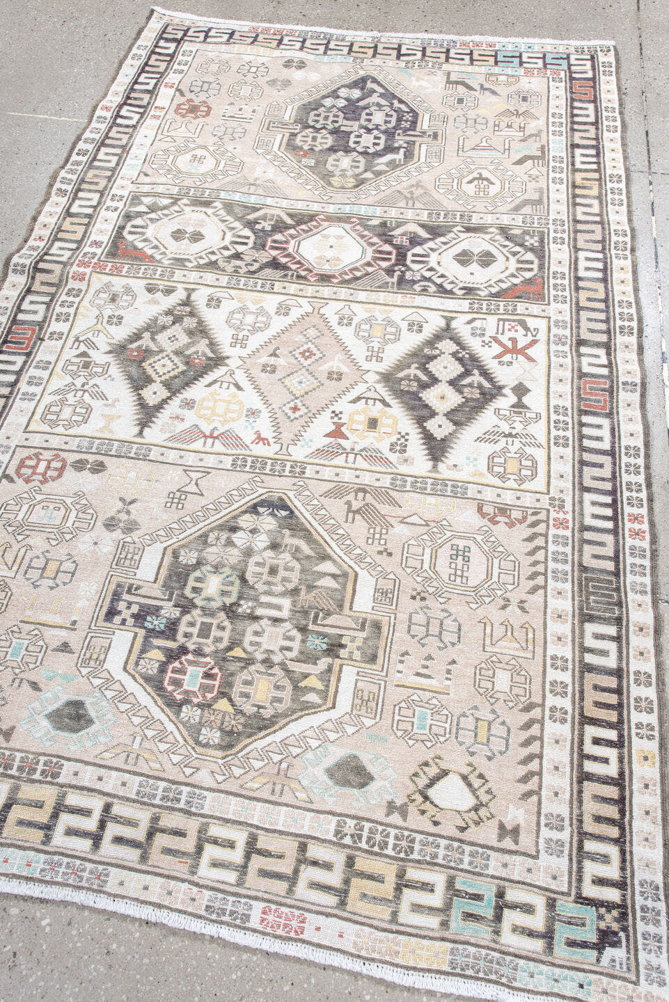 4' x 6' one-of-a-kind handmade antique Sumak small size rug. Color palette: ivory, charcoal, taupe, soft blue, rust, camel