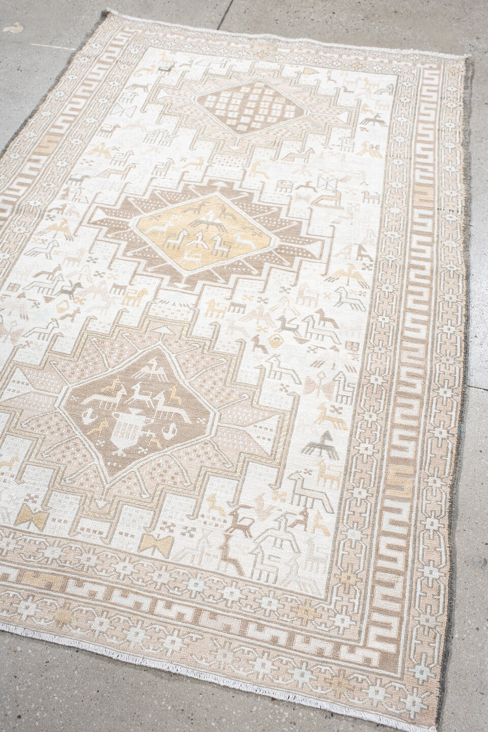 3' x 5' one-of-a-kind handmade vintage Sumak small size rug. Color palette: ivory, beige, taupe, cream, pale gold, camel
