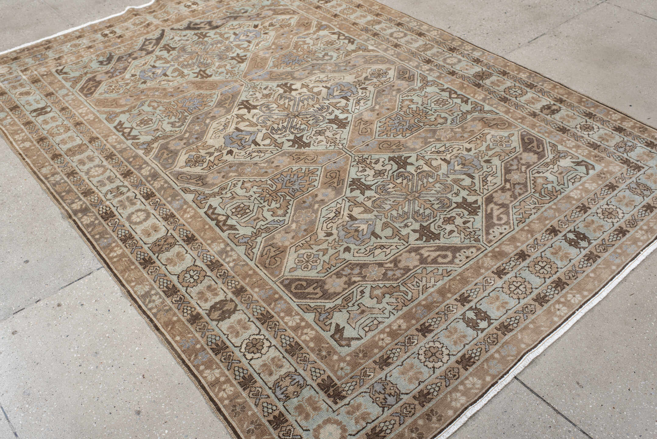 5' x 8' one-of-a-kind handmade antique Malayer medium size rug. Color palette: ivory, taupe, brown, beige, pale blue, camel