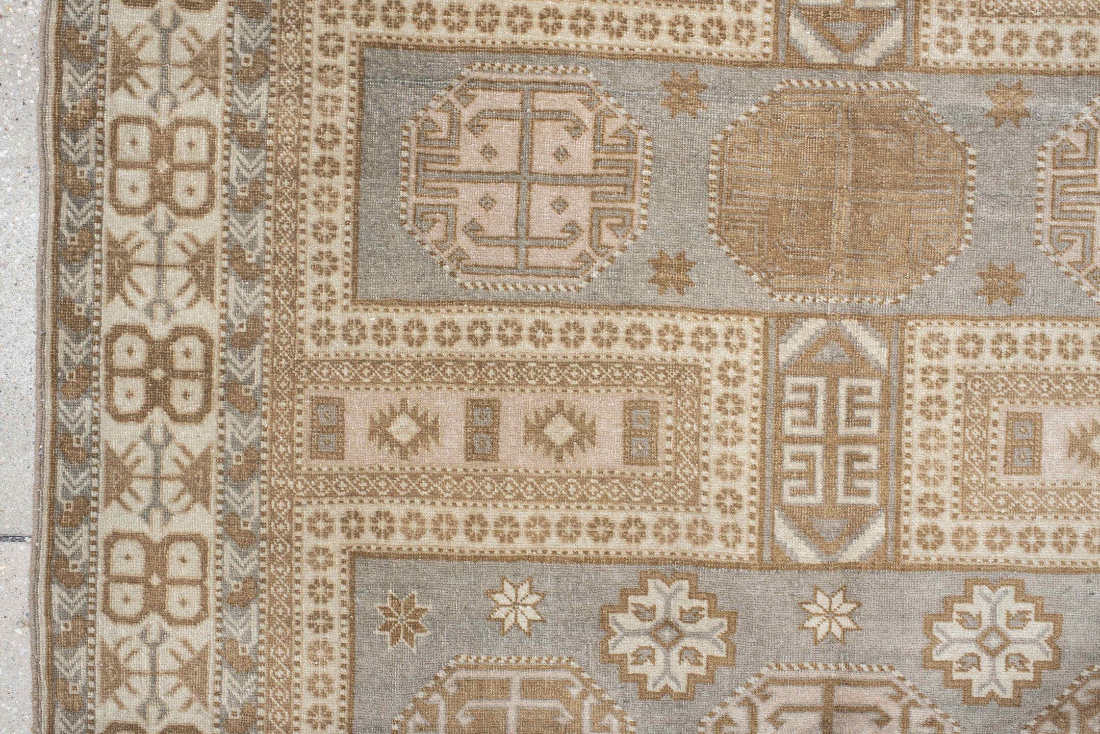 4' x 5' one-of-a-kind handmade vintage Sivas small size rug. Color palette: off-white, light gray, gray, brown, orange