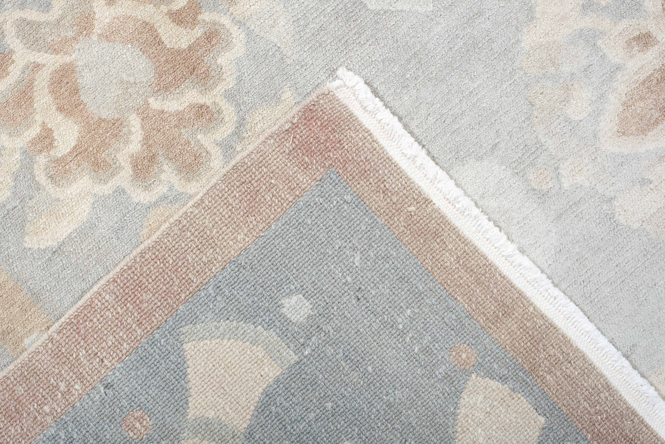 6' x 7' one-of-a-kind handmade antique Tibetan rug. Color palette: pale blue, ivory, blush, sand, taupe, light blue, pink