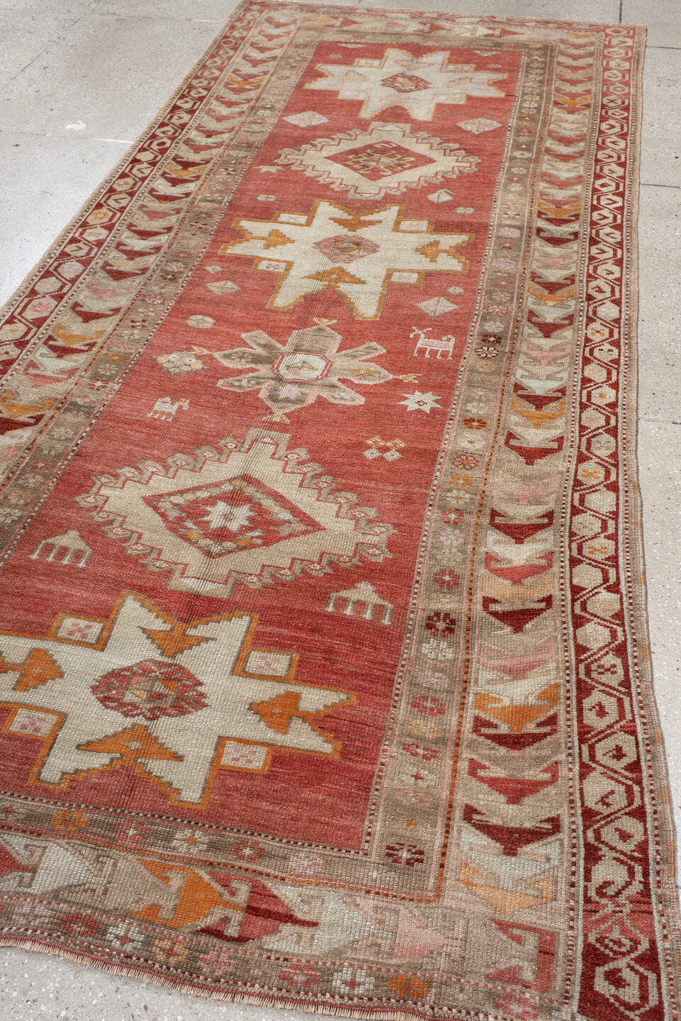 4' x 10' one-of-a-kind handmade antique Karabagh runner rug. Color palette: terra cotta, ivory, rust, beige, camel, saffron