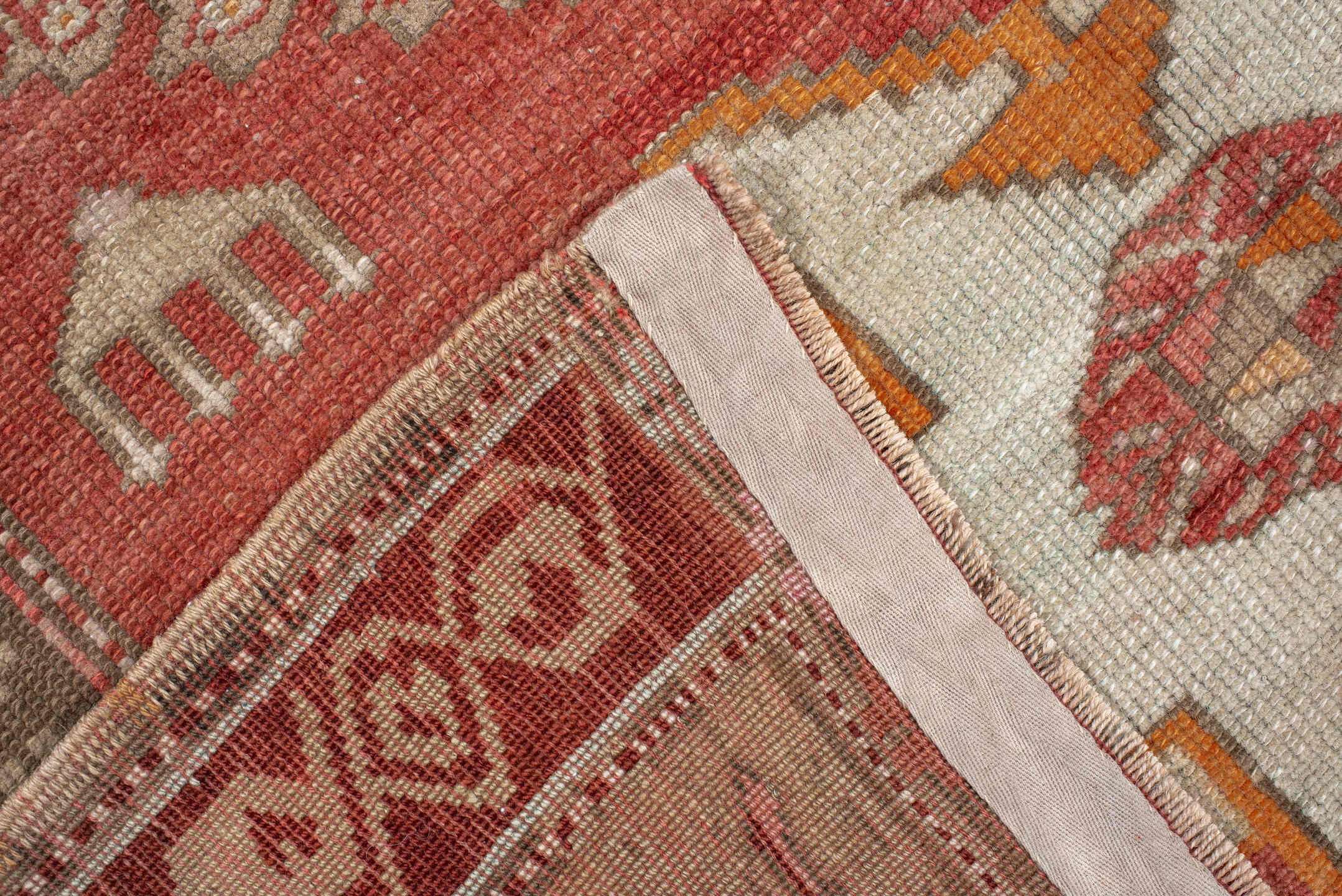 4' x 10' one-of-a-kind handmade antique Karabagh runner rug. Color palette: terra cotta, ivory, rust, beige, camel, saffron