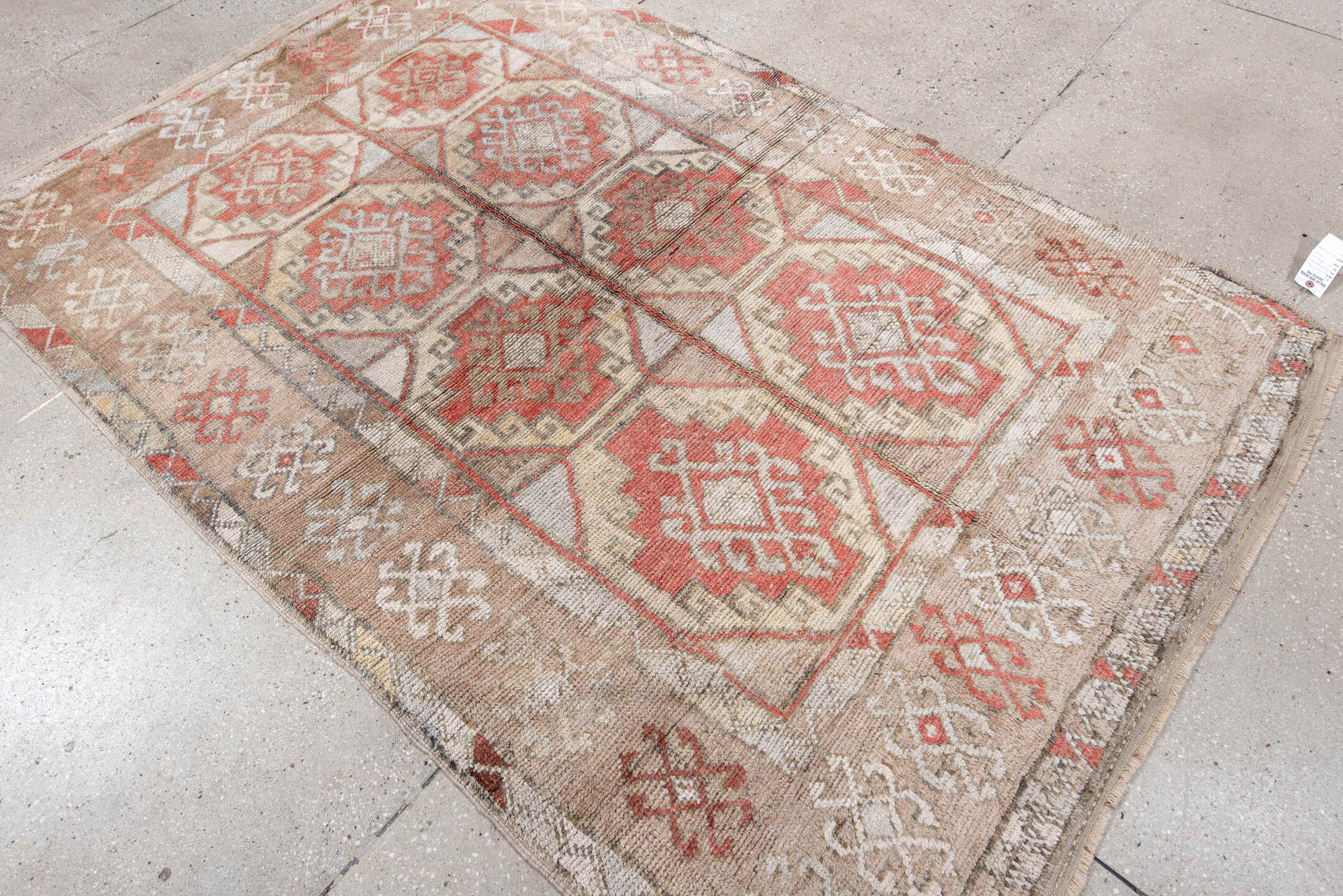 4' x 7' one-of-a-kind handmade vintage Anatol rug. Color palette: brown, gray, light gray, off-white, pink, red, silver