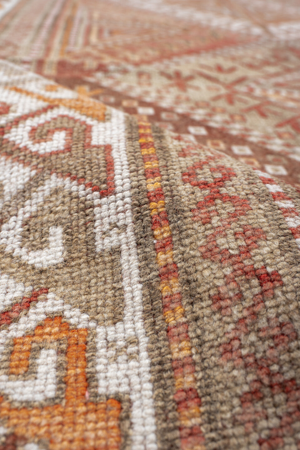 4' x 12' one-of-a-kind handmade vintage Anatol runner rug. Color palette: brown, gray, light gray, off-white, orange, pink