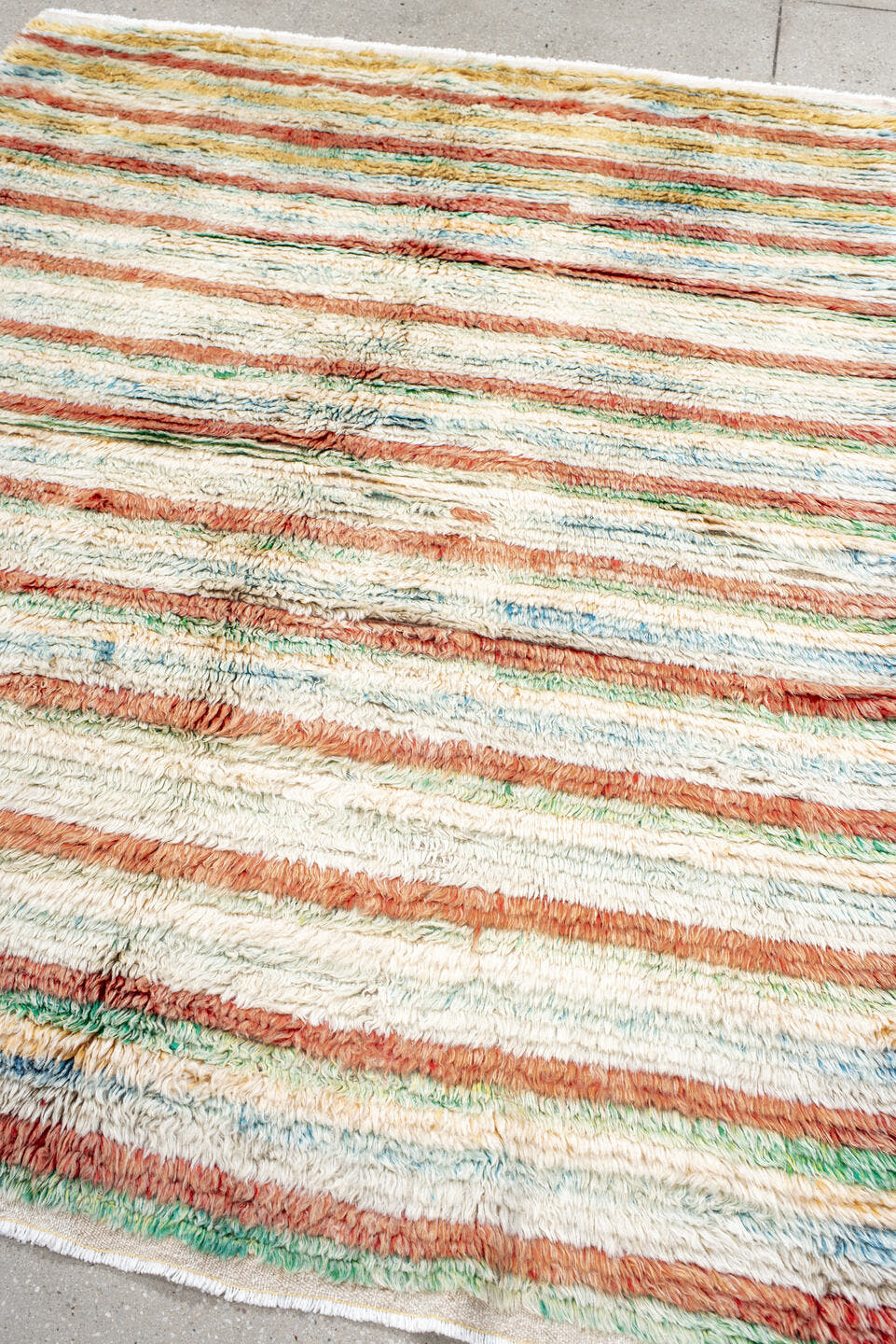 5' x 7' one-of-a-kind handmade vintage Moroccan rug. Color palette: ivory, coral, aqua, saffron, green, rust, terracotta