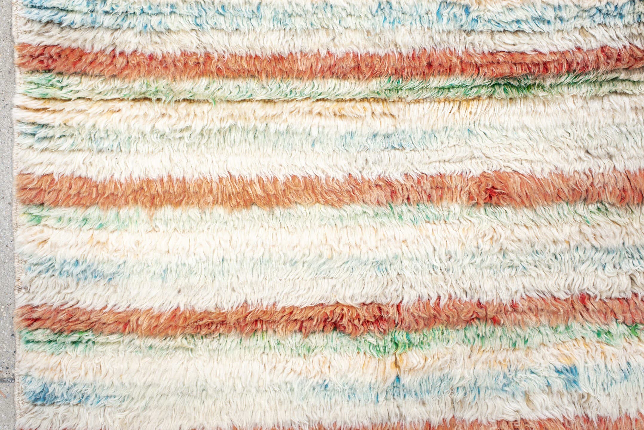 5' x 7' one-of-a-kind handmade vintage Moroccan rug. Color palette: ivory, coral, aqua, saffron, green, rust, terracotta