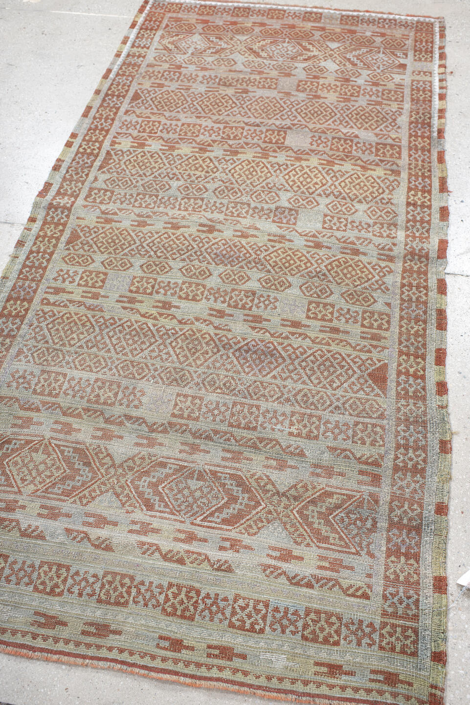 3' x 6' one-of-a-kind handmade antique Sumak runner rug. Color palette: ivory, terra cotta, camel, taupe, terracotta, brown