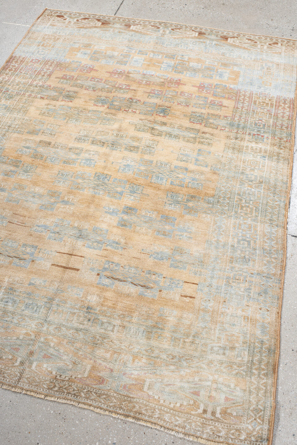 4' x 5' one-of-a-kind handmade antique Yamoud small size rug. Color palette: ivory, pale blue, camel, soft rust, taupe