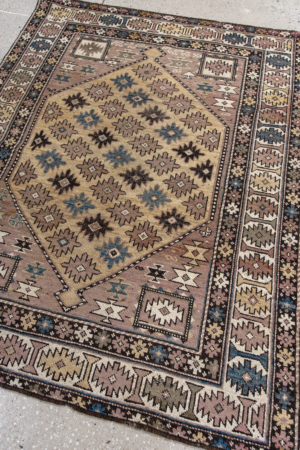 4' x 4' one-of-a-kind handmade antique Shirvan small size rug. Color palette: ivory, taupe, indigo, brown, slate, camel
