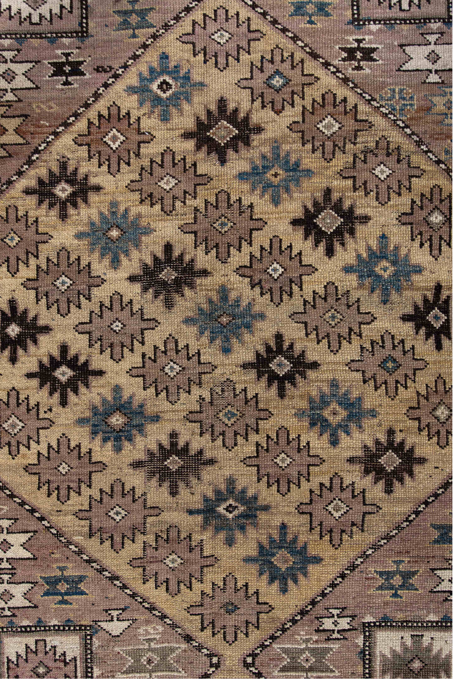 4' x 4' one-of-a-kind handmade antique Shirvan small size rug. Color palette: ivory, taupe, indigo, brown, slate, camel