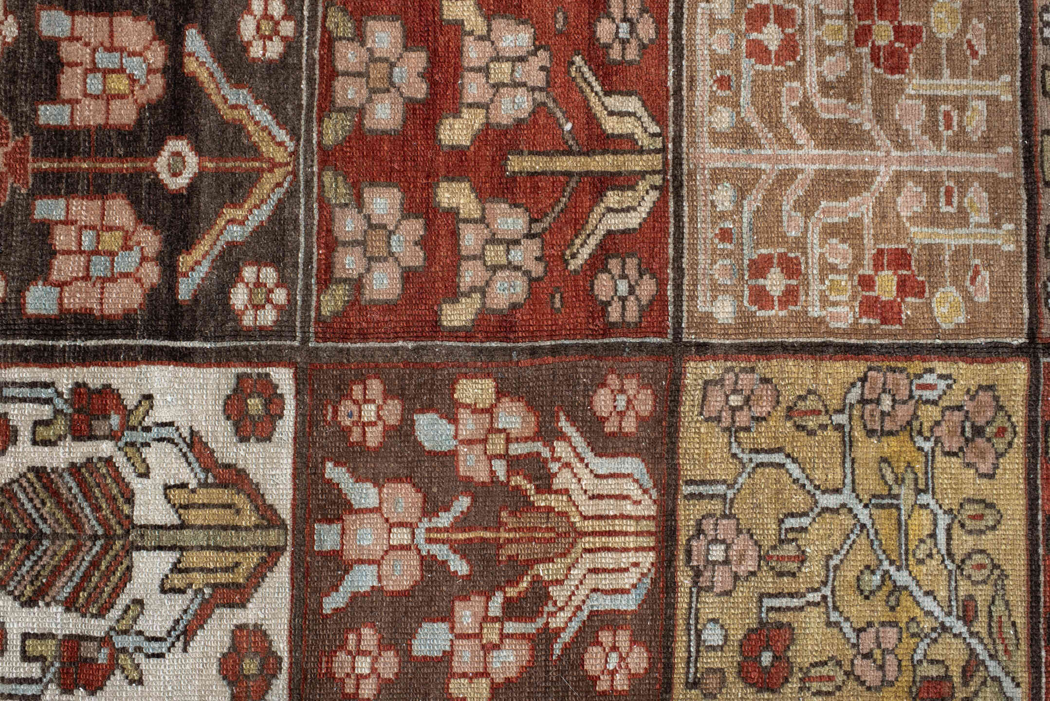 5' x 7' one-of-a-kind handmade antique Baktiary rug. Color palette: rust, ivory, brown, sky blue, sage, taupe, camel