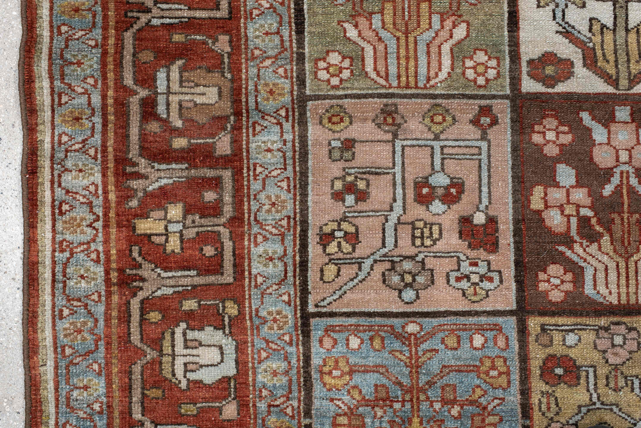 5' x 7' one-of-a-kind handmade antique Baktiary rug. Color palette: rust, ivory, brown, sky blue, sage, taupe, camel