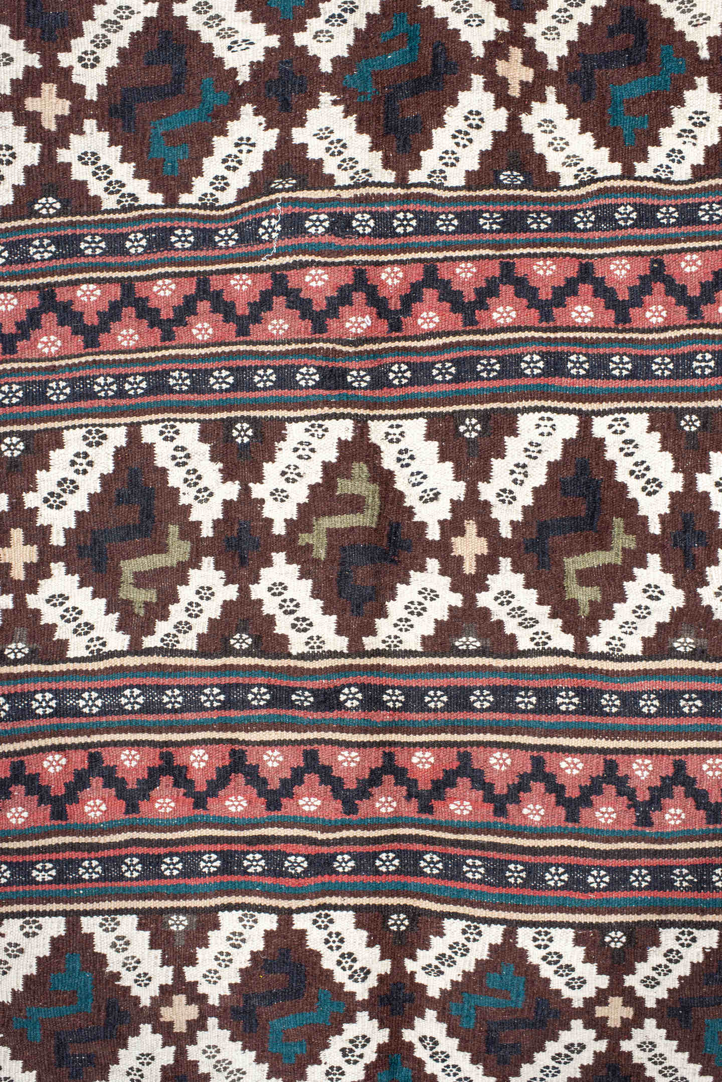 5' x 7' one-of-a-kind handmade vintage Kilim rug. Color palette: brown, ivory, rose, teal, charcoal, olive, pink, red, gray
