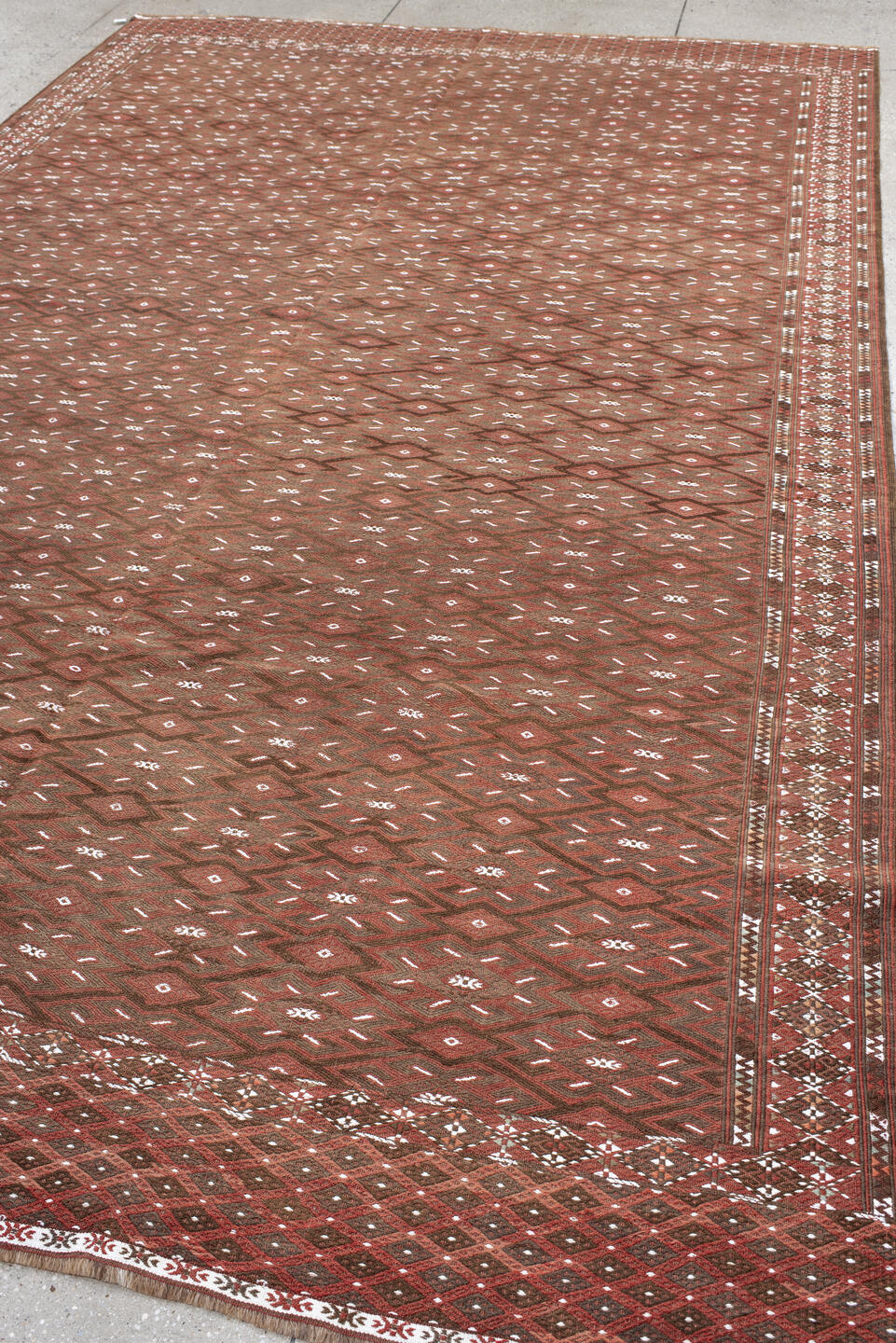 7' x 12' one-of-a-kind handmade antique Kilim large size rug. Color palette: rust, brown, ivory, terra cotta, taupe