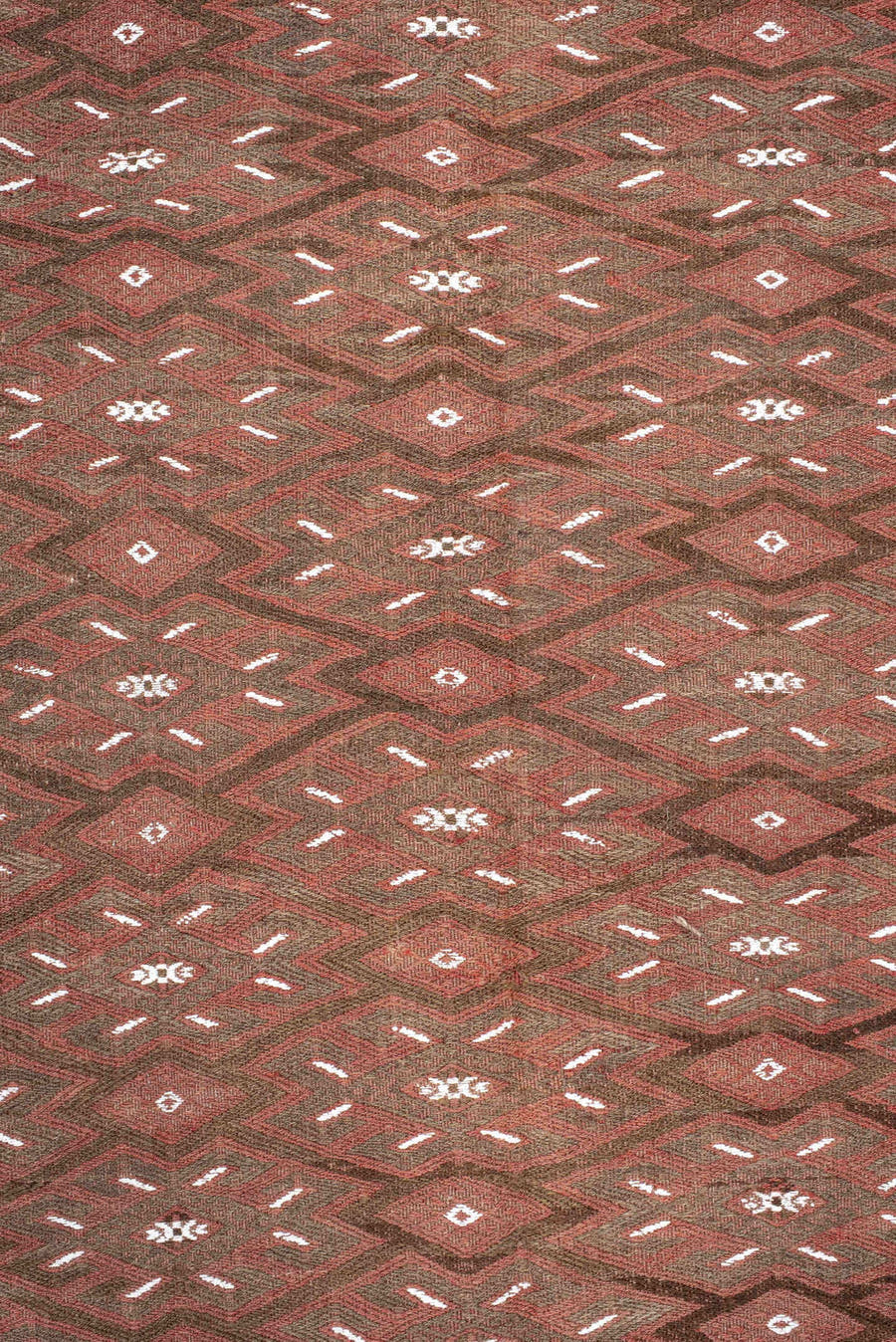 7' x 12' one-of-a-kind handmade antique Kilim large size rug. Color palette: rust, brown, ivory, terra cotta, taupe