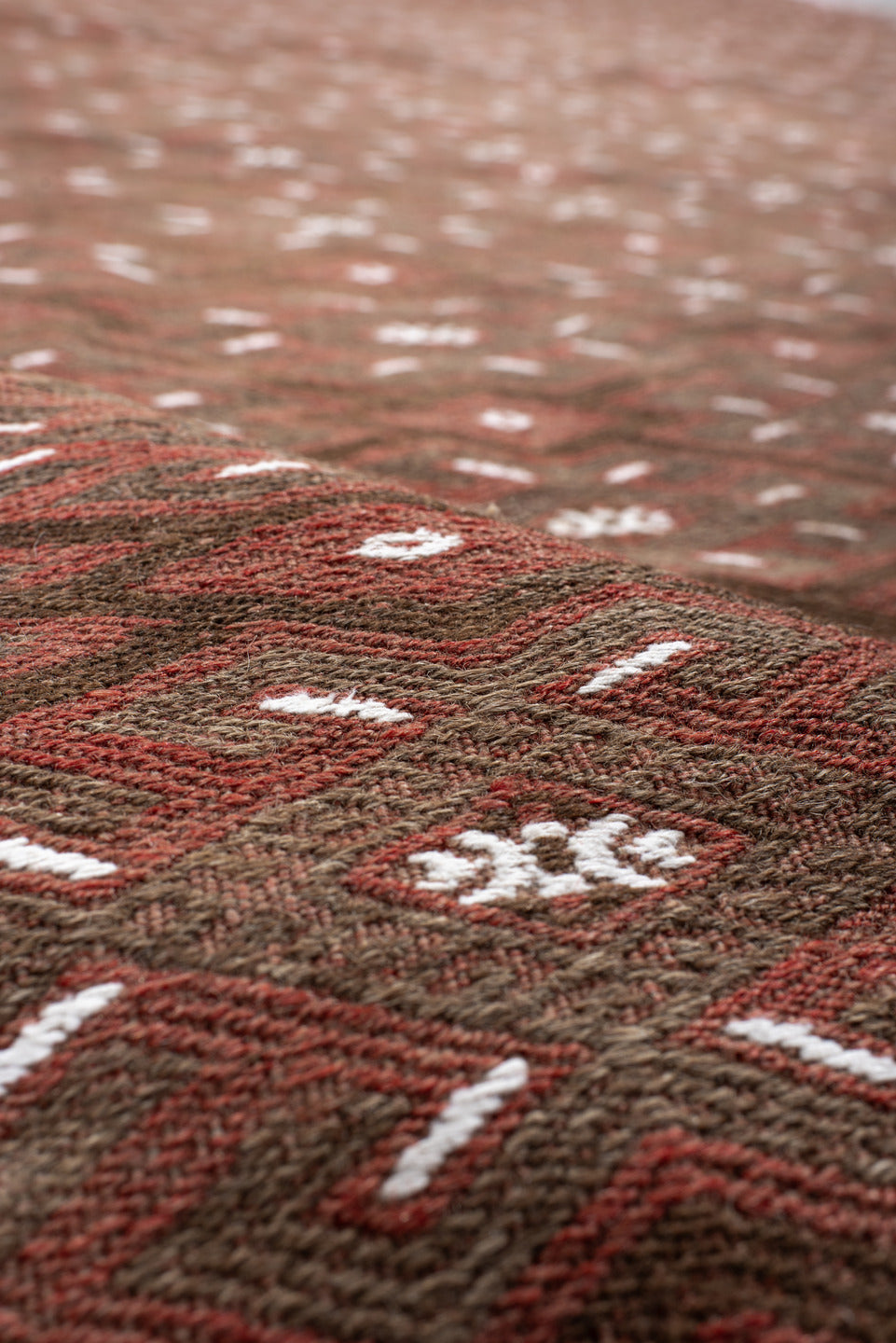 7' x 12' one-of-a-kind handmade antique Kilim large size rug. Color palette: rust, brown, ivory, terra cotta, taupe