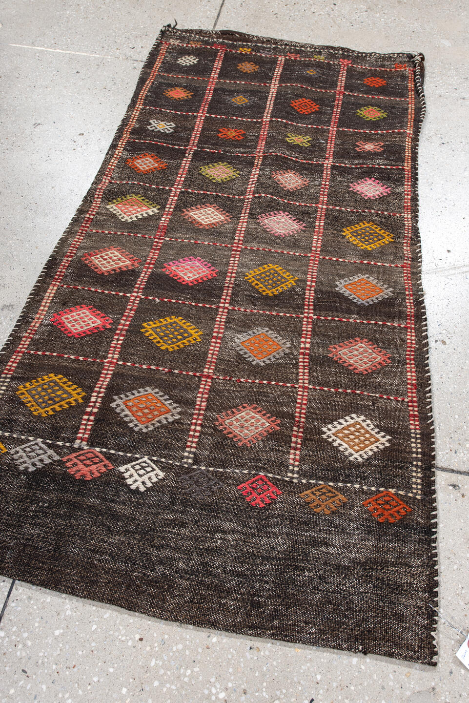 2' x 4' one-of-a-kind handmade vintage Jijim small size rug. Color palette: red, pink, gray, brown, off-white, light gray