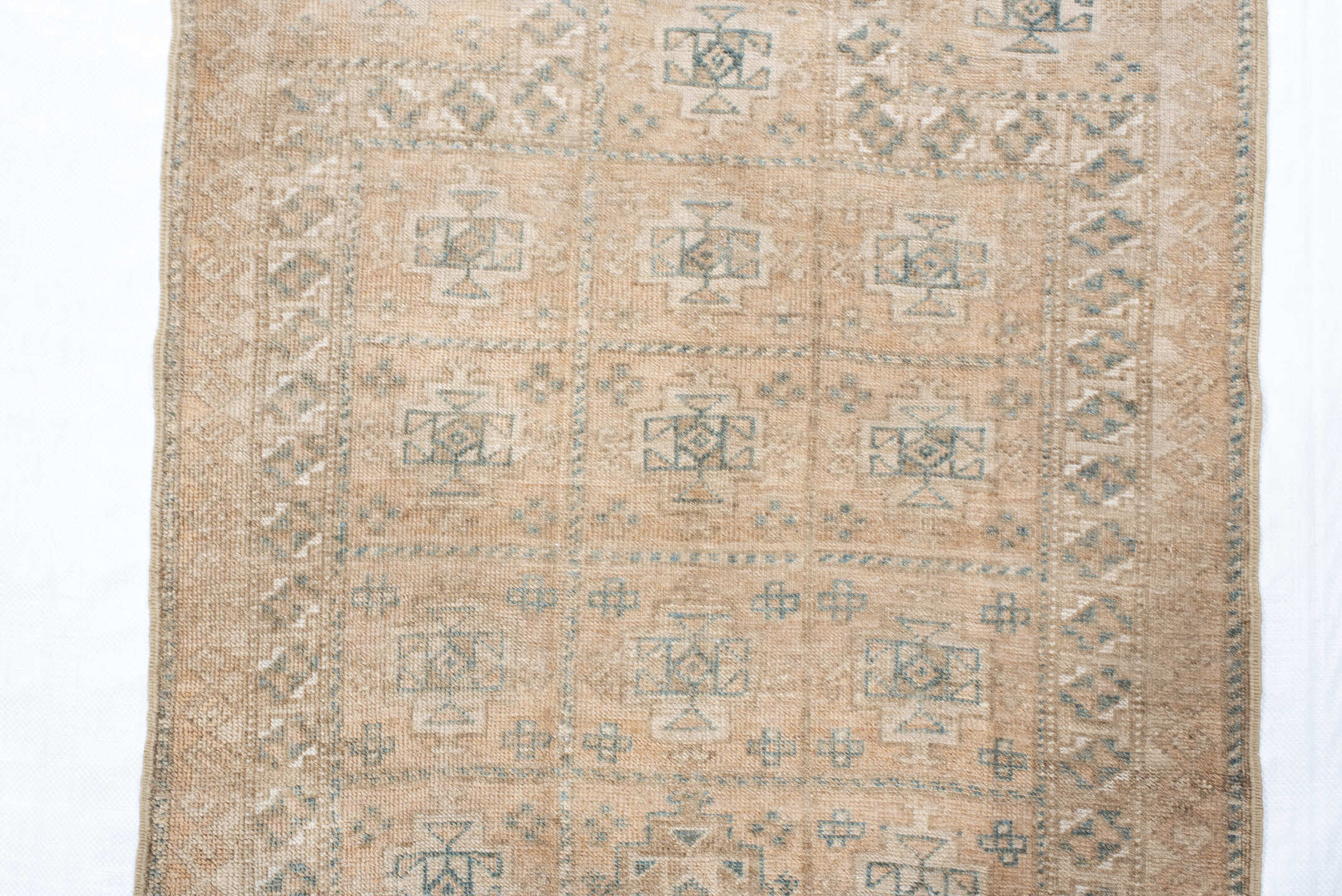 2' x 4' one-of-a-kind handmade vintage Belouch small size rug. Color palette: ivory, taupe, camel, pale blue, brown, sage