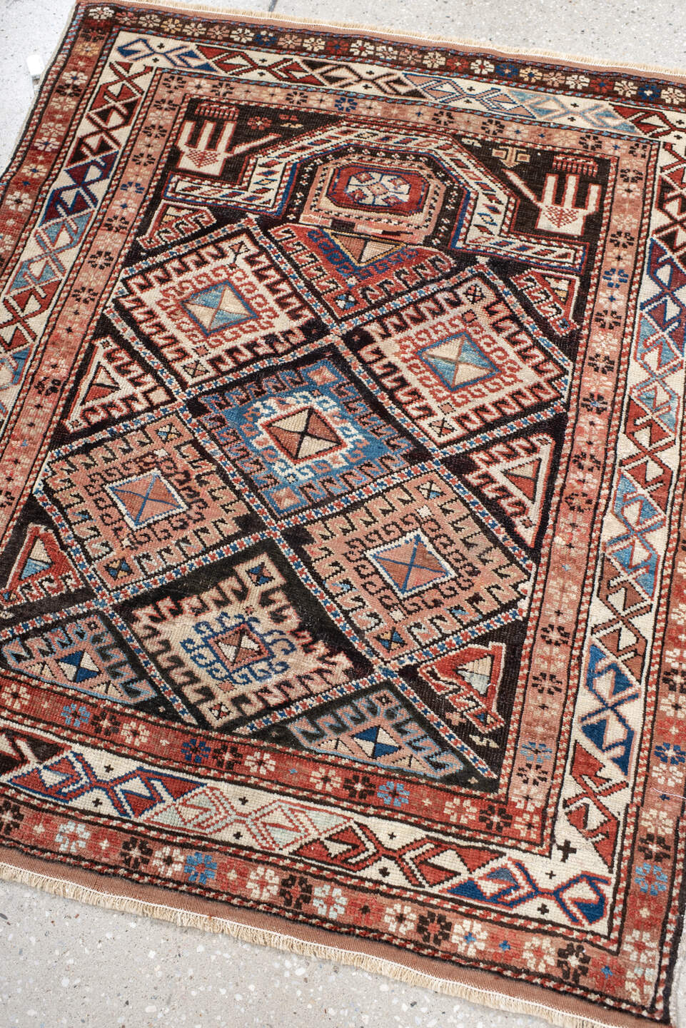 2' x 3' one-of-a-kind handmade antique Shirvan small size rug. Color palette: ivory, rust, brown, sky blue, navy, black
