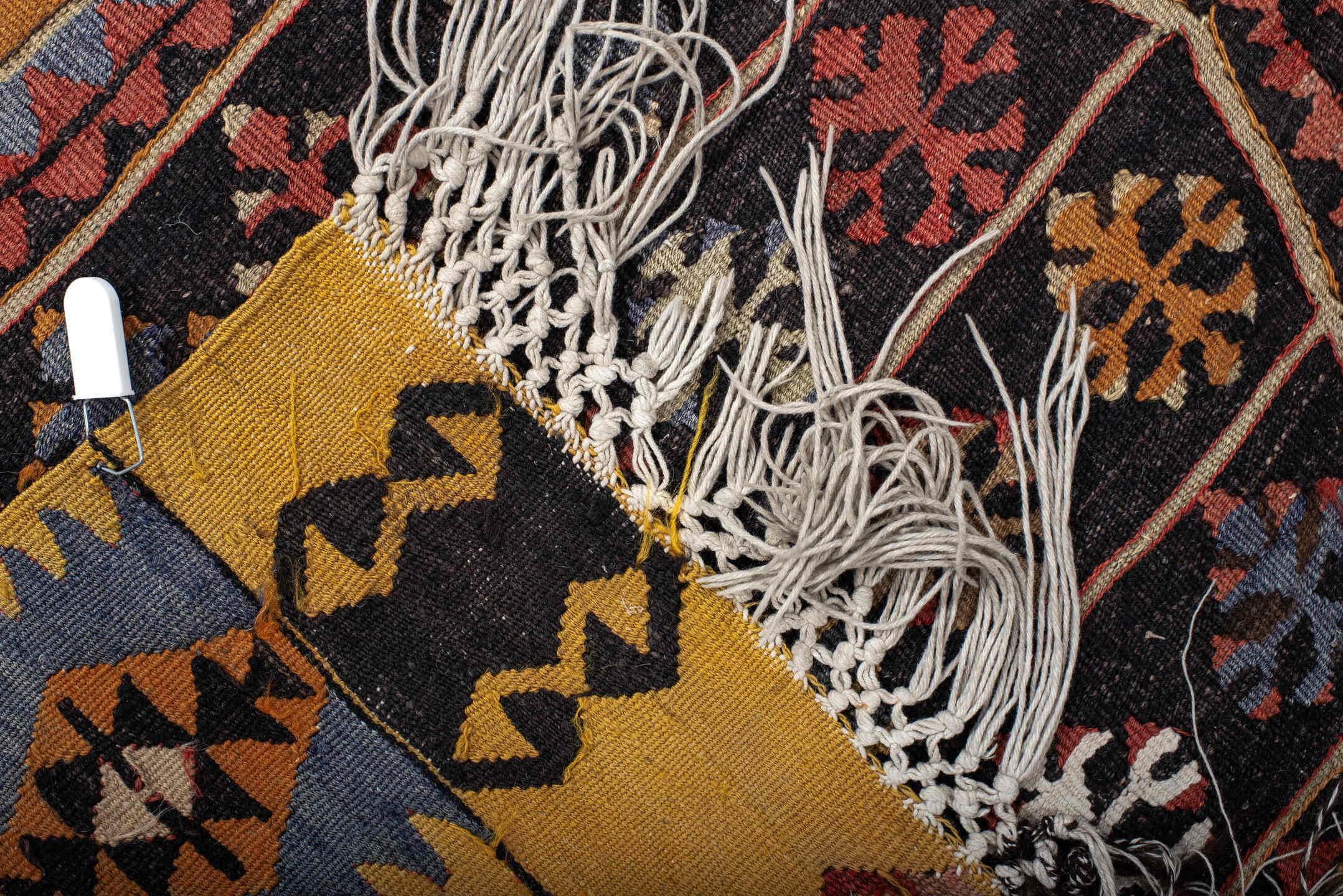 3' x 7' one-of-a-kind handmade antique Kilim runner rug. Color palette: gold, brown, ivory, slate, rust, black, camel, blue