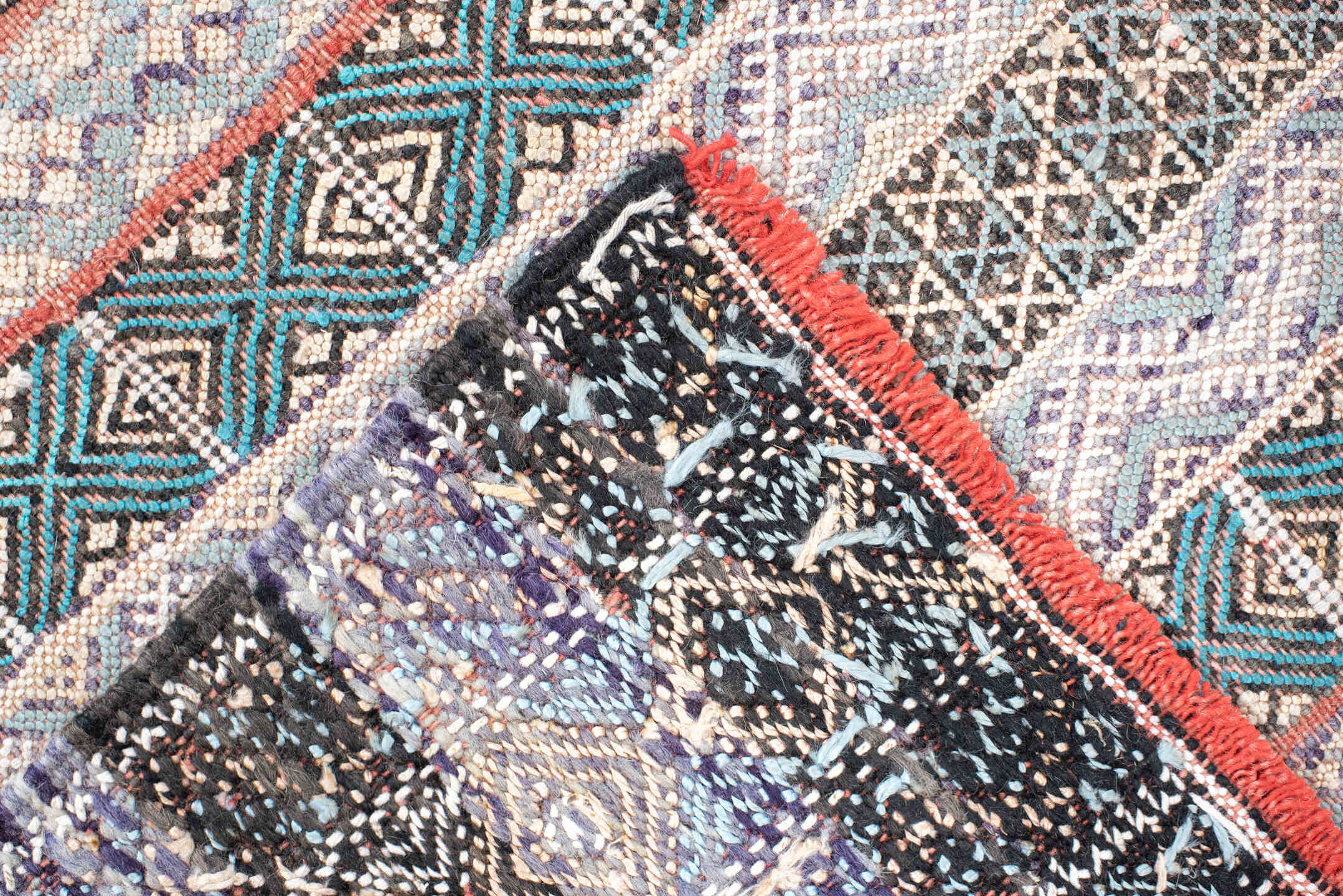 3' x 6' one-of-a-kind handmade vintage Moroccan small size rug. Color palette: ivory, indigo, sky blue, charcoal, rust