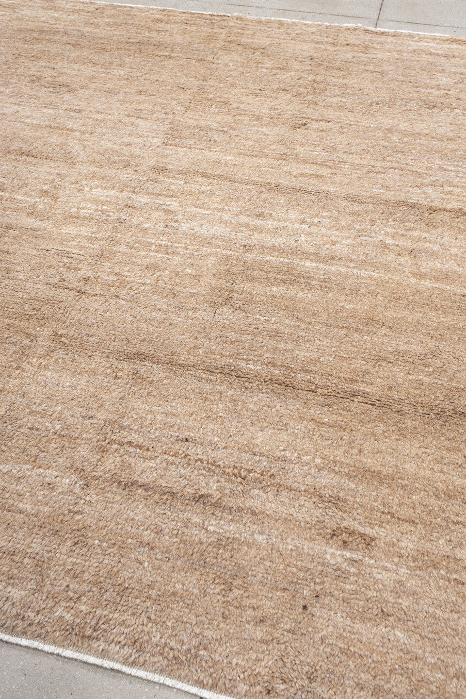 8' x 9' one-of-a-kind handmade vintage India rug. Color palette: tan, camel, taupe, beige, cream, gray, ivory