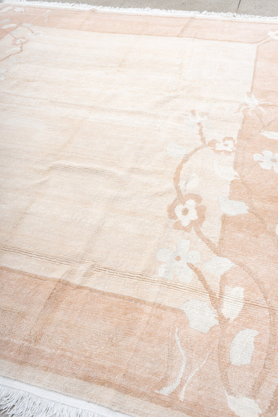 8' x 9' one-of-a-kind handmade vintage Tibetan rug. Color palette: ivory, blush, peach, cream, taupe, pink, terracotta