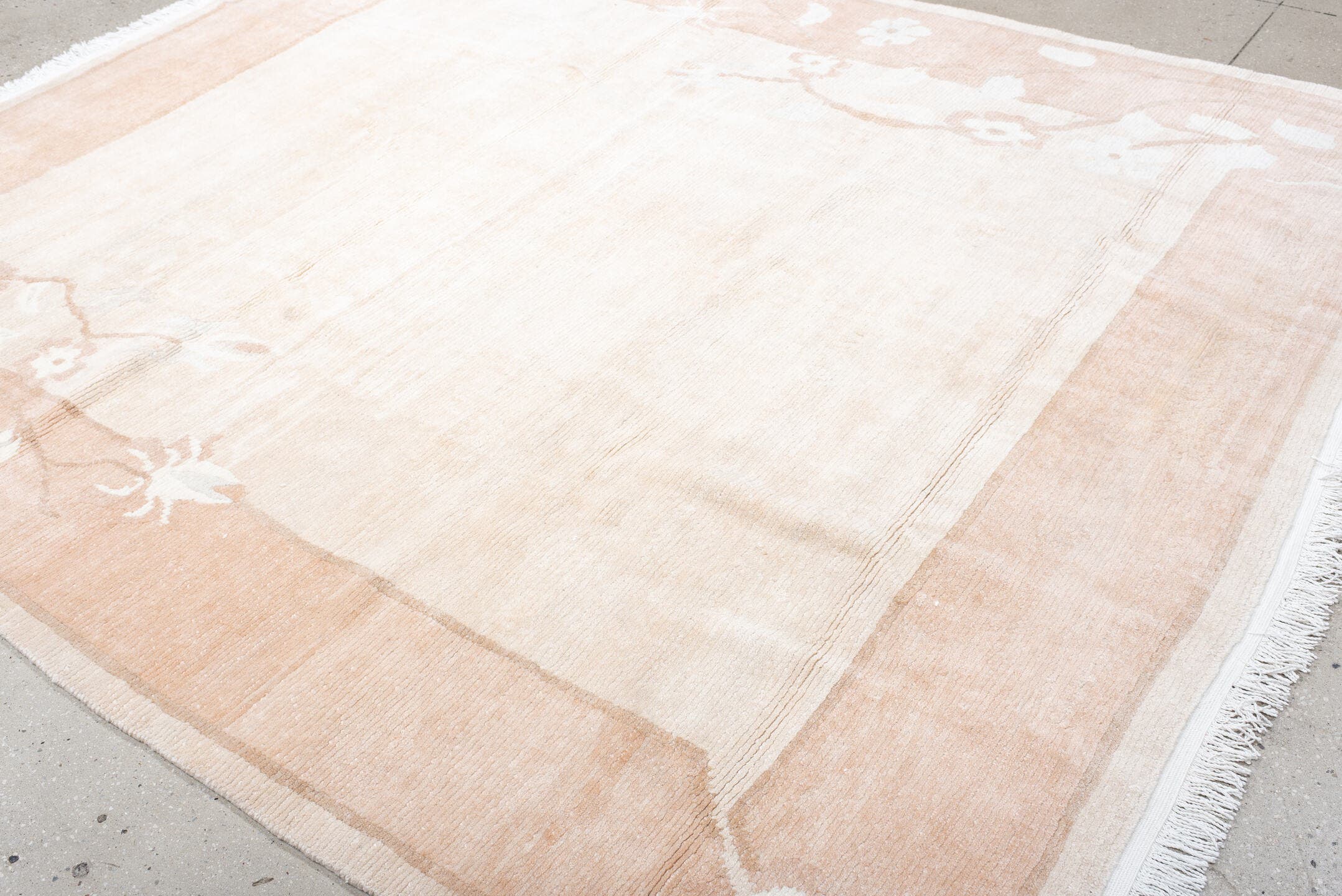 8' x 9' one-of-a-kind handmade vintage Tibetan rug. Color palette: ivory, blush, peach, cream, taupe, pink, terracotta