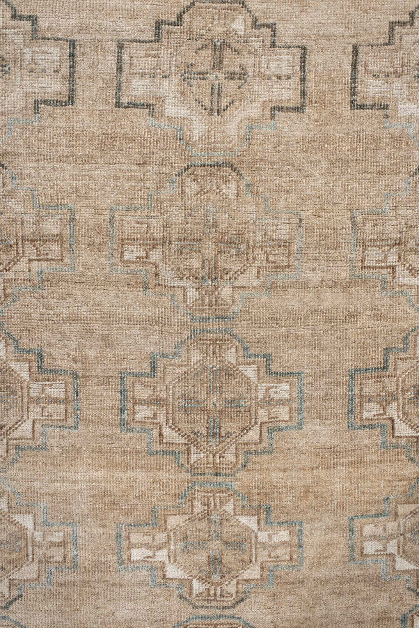 7' x 9' one-of-a-kind handmade antique Afghan rug. Color palette: ivory, taupe, pale blue, beige, camel, light brown, gray