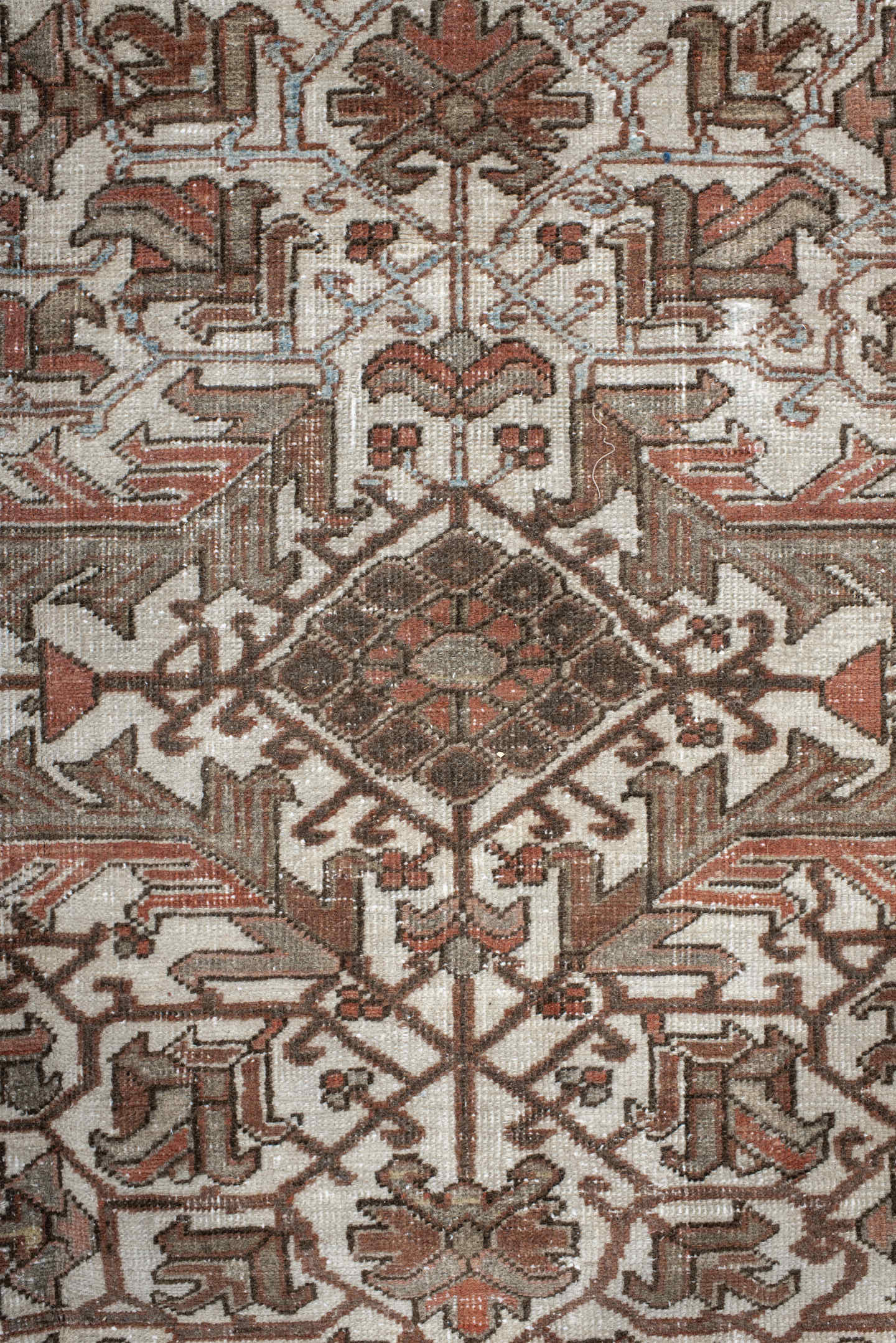 6' x 9' one-of-a-kind handmade antique Heriz medium size rug. Color palette: ivory, brown, sky_blue, rust, taupe, charcoal