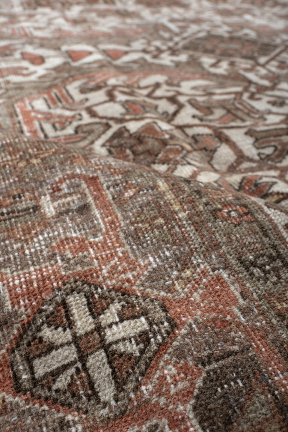 6' x 9' one-of-a-kind handmade antique Heriz medium size rug. Color palette: ivory, brown, sky_blue, rust, taupe, charcoal