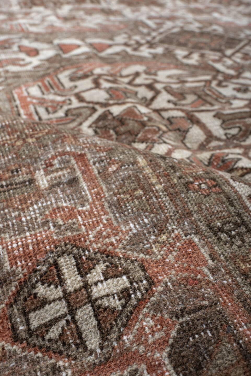 6' x 9' one-of-a-kind handmade antique Heriz medium size rug. Color palette: ivory, brown, sky_blue, rust, taupe, charcoal