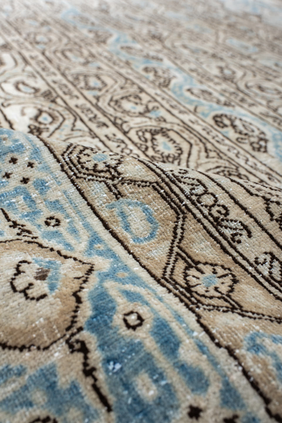 4' x 7' one-of-a-kind handmade antique Qum rug. Color palette: ivory, sky blue, taupe, brown, light blue, beige, gray