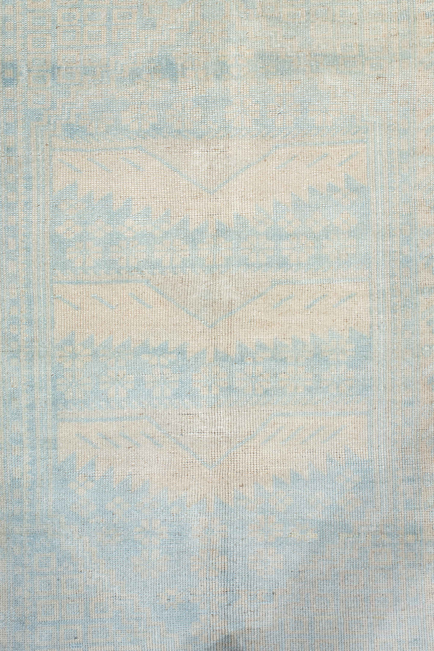 2' x 4' one-of-a-kind handmade vintage Anatolian small size rug. Color palette: ivory, pale blue, cream, sky blue