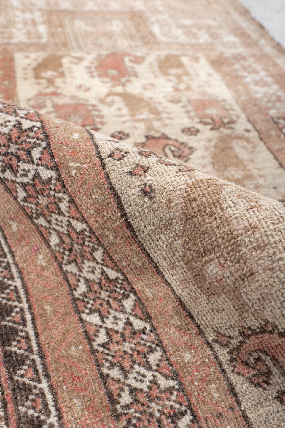1' x 3' one-of-a-kind handmade vintage Belouch small size rug. Color palette: ivory, camel, blush, brown, charcoal, rose