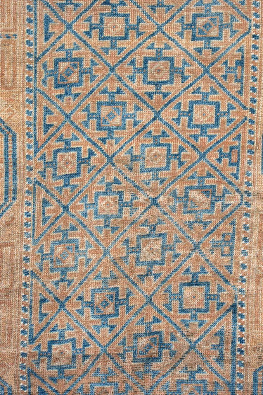 2' x 4' one-of-a-kind handmade antique Belouch small size rug. Color palette: peach, ivory, sky blue, camel, taupe