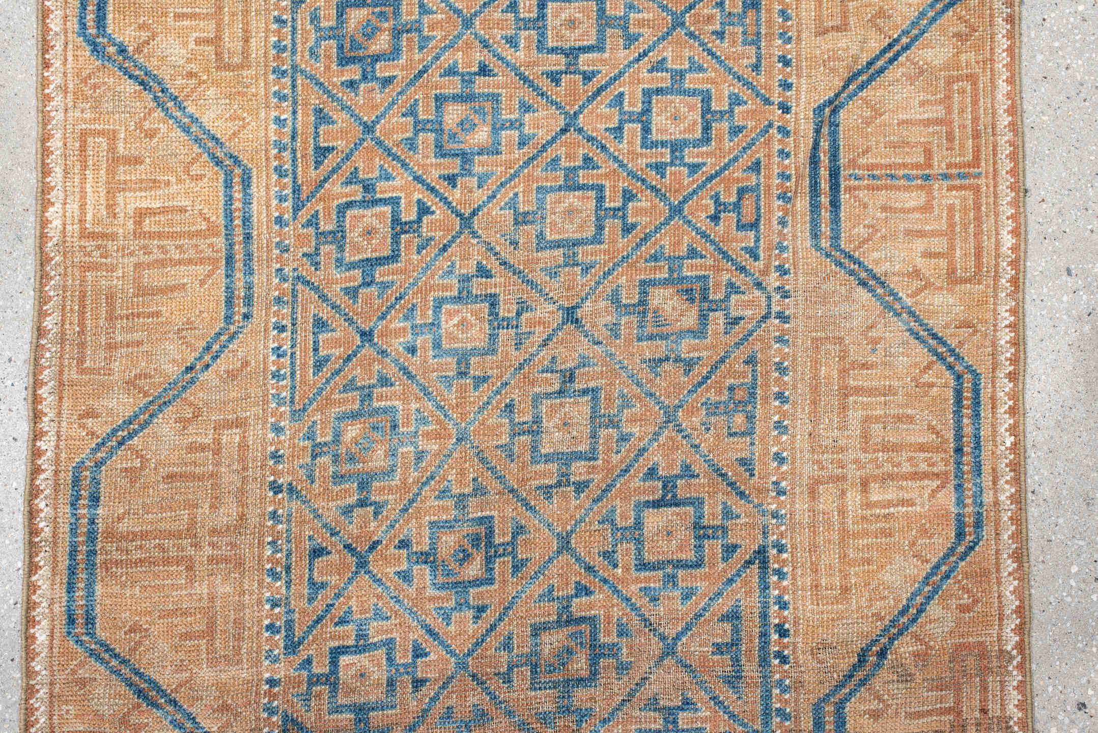 2' x 4' one-of-a-kind handmade antique Belouch small size rug. Color palette: peach, ivory, sky blue, camel, taupe