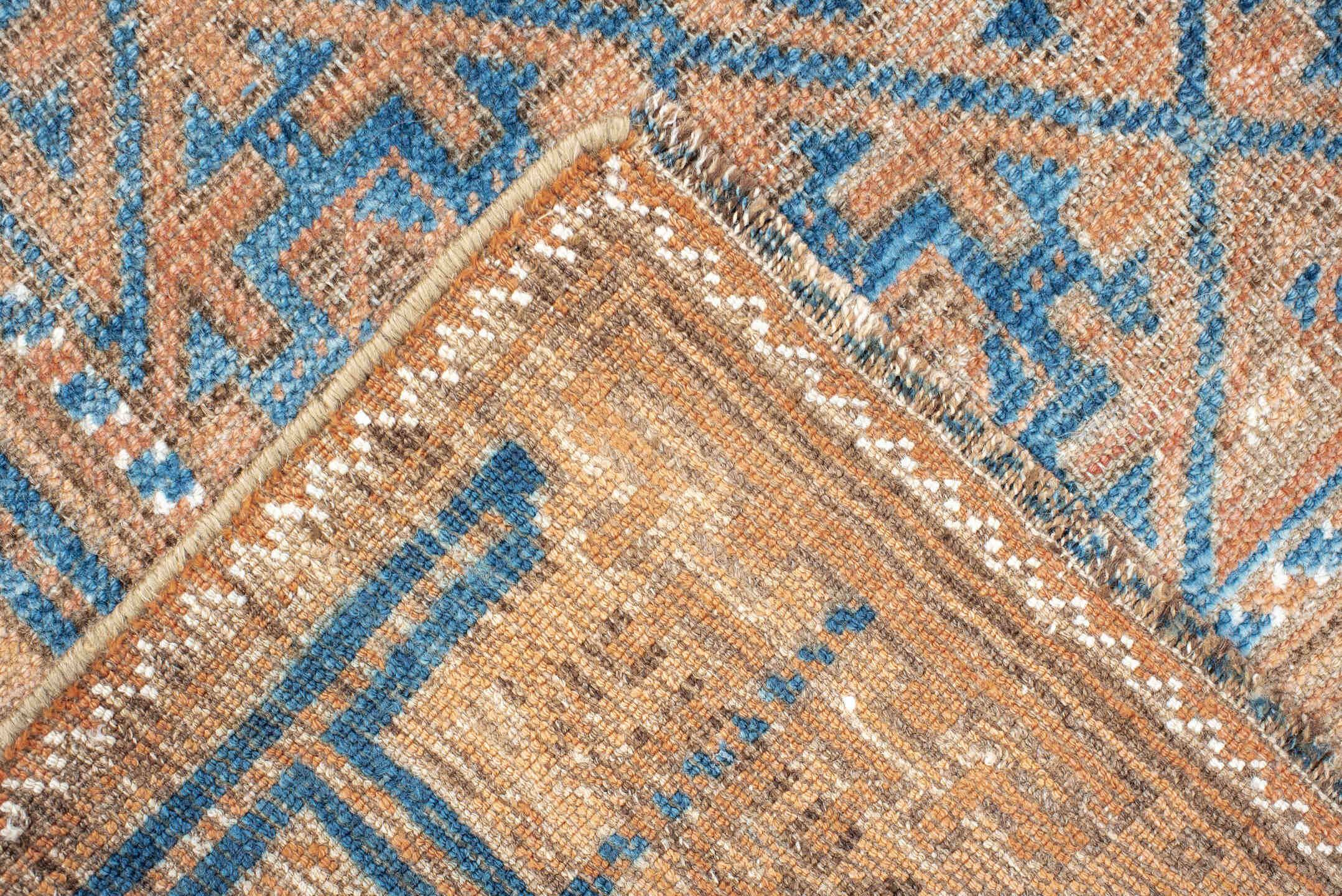 2' x 4' one-of-a-kind handmade antique Belouch small size rug. Color palette: peach, ivory, sky blue, camel, taupe