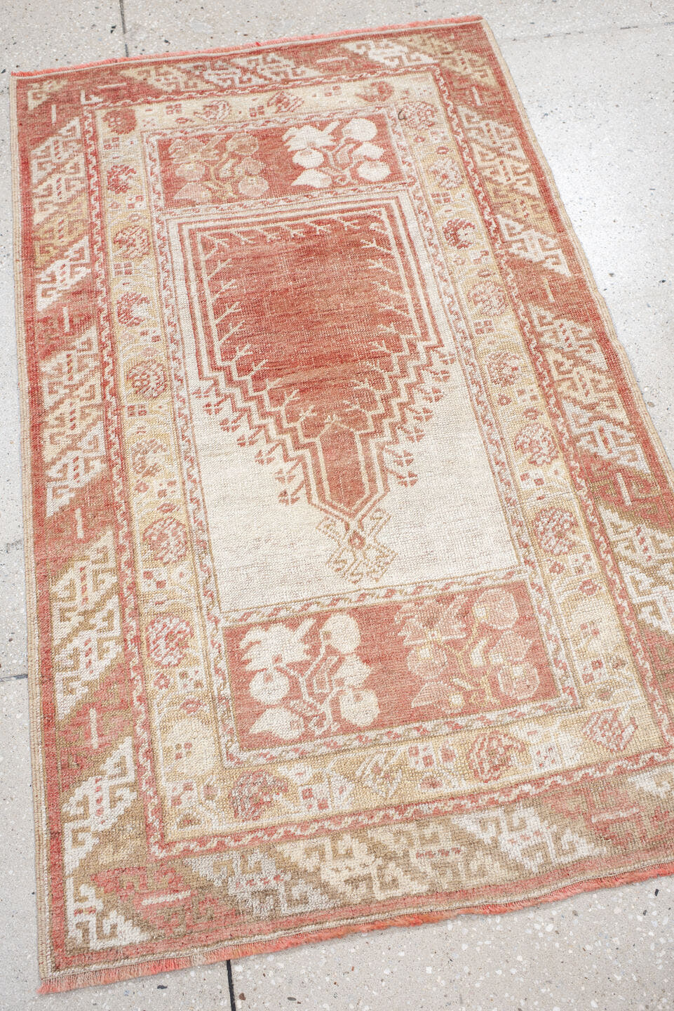 2' x 4' one-of-a-kind handmade antique Anatolian small size rug. Color palette: ivory, terra cotta, sand, blush, camel