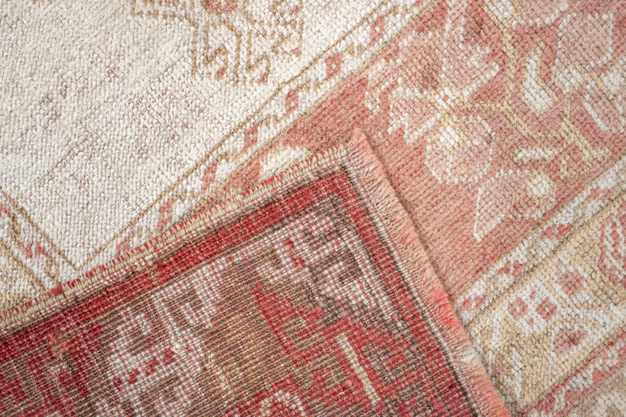2' x 4' one-of-a-kind handmade antique Anatolian small size rug. Color palette: ivory, terra cotta, sand, blush, camel